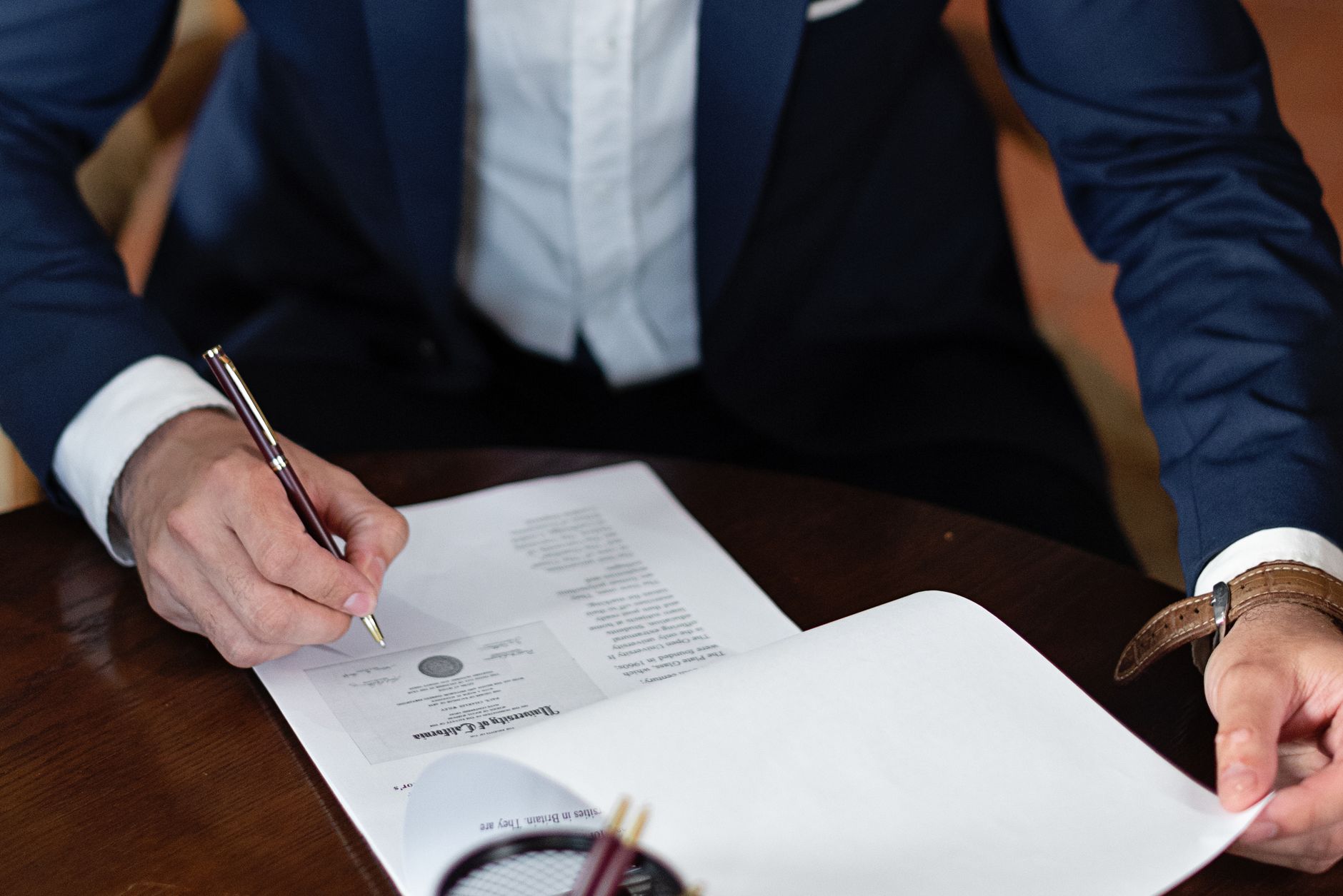 Lawyer reviewing legal documents at a desk